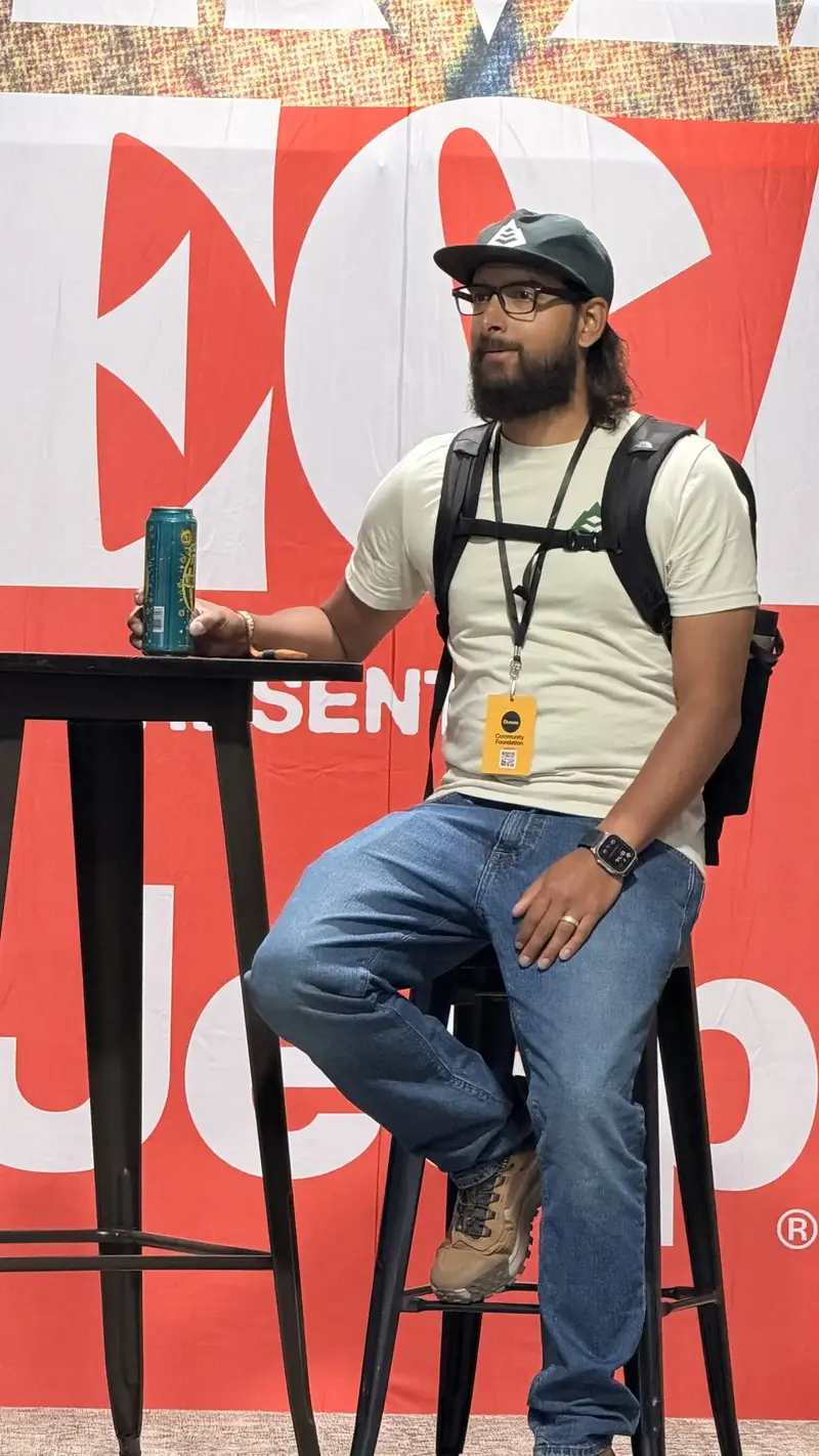 Erik Menches presenting on stage at OutsideDays